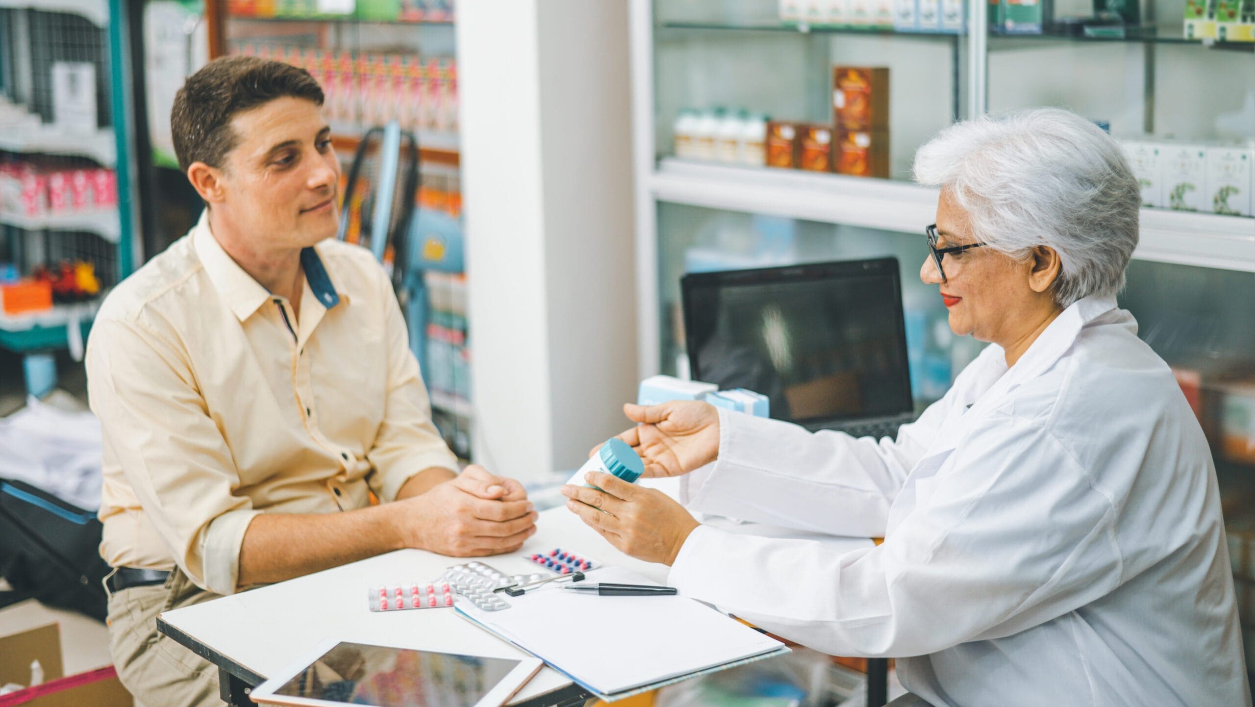 Doctor giving advice to a patient about managing Type 2 diabetes with Alogliptin Benzoate, including the Medicare prior authorization process.