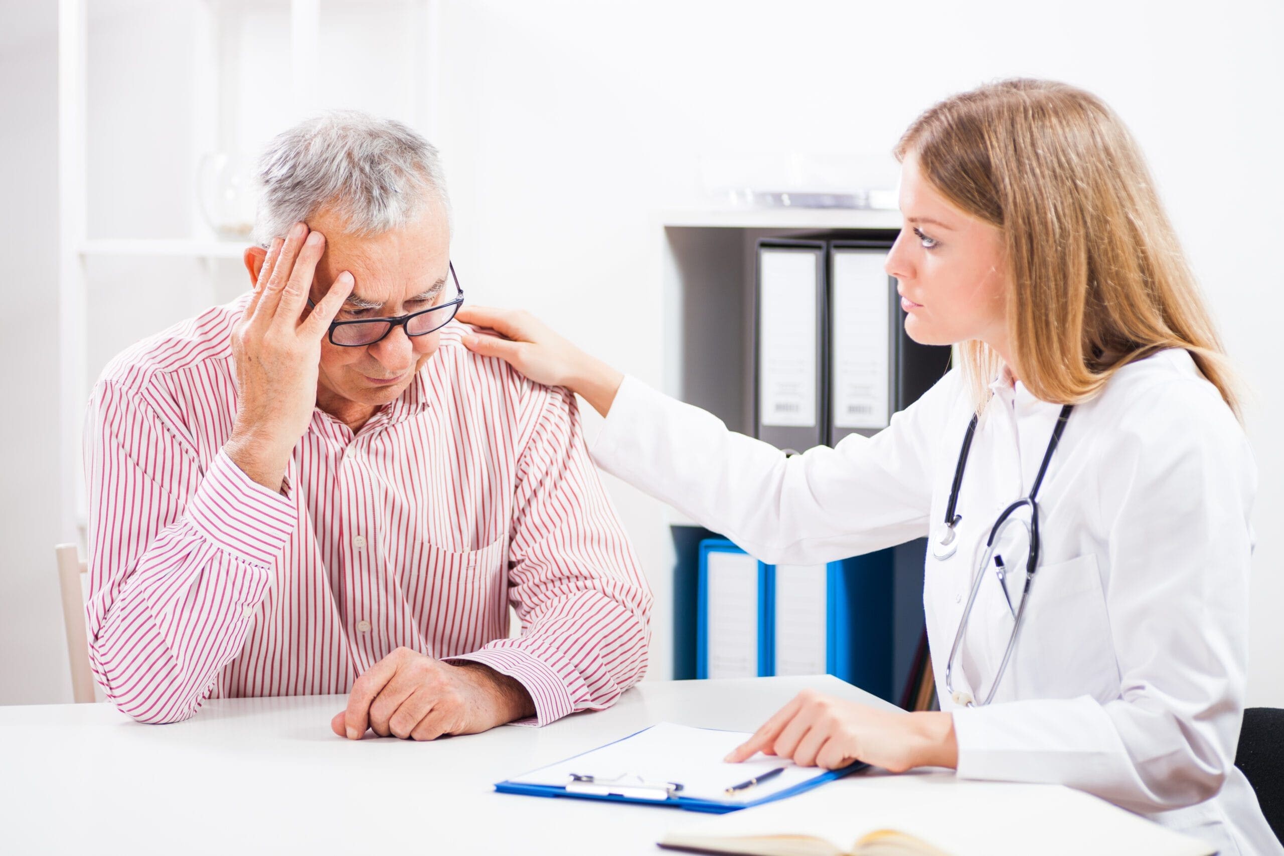 Doctor providing support to a patient discussing Medicare prior authorization requirements for Dapagliflozin to manage Type 2 diabetes.