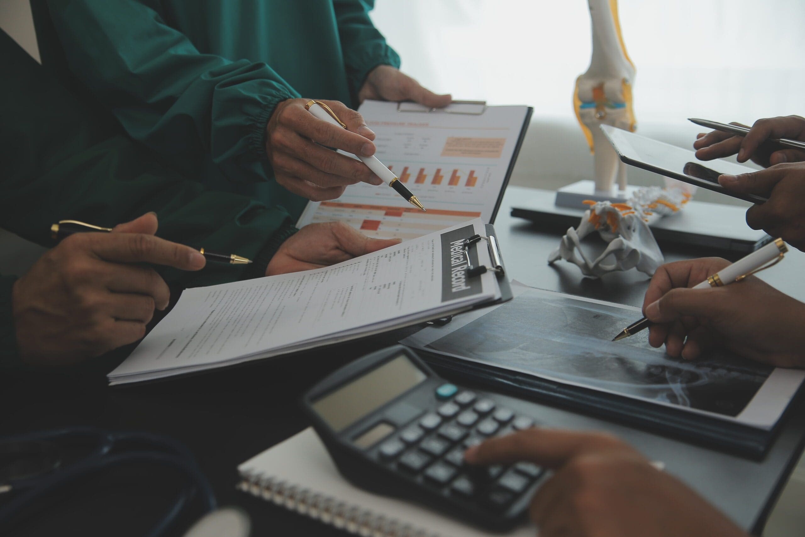 A certified medical coder reviewing patient records for accurate billing