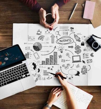 Digital healthcare tools displayed on a laptop, smartwatch, and mobile devices, representing healthcare digital marketing strategies.