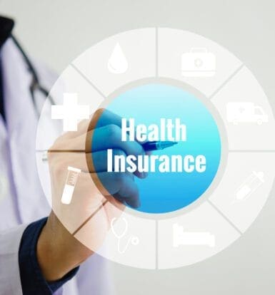 A healthcare professional using CMM software on a laptop.