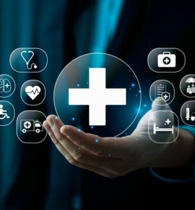 Medical coding professional working on a computer remotely for a New York clinic.