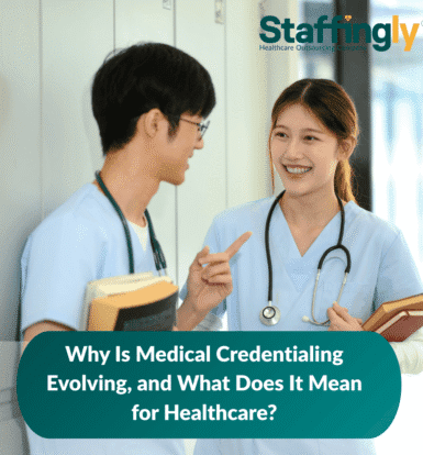 Healthcare professionals using a digital credentialing dashboard on a computer